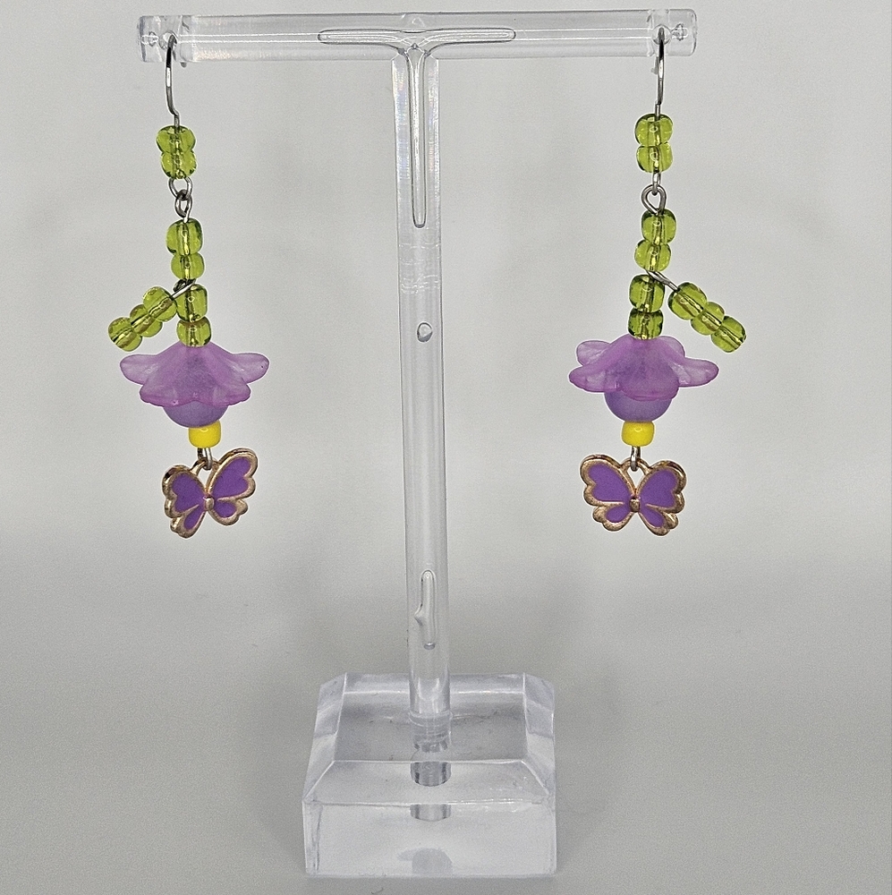 Handmade purple flyin' flower drop earrings
